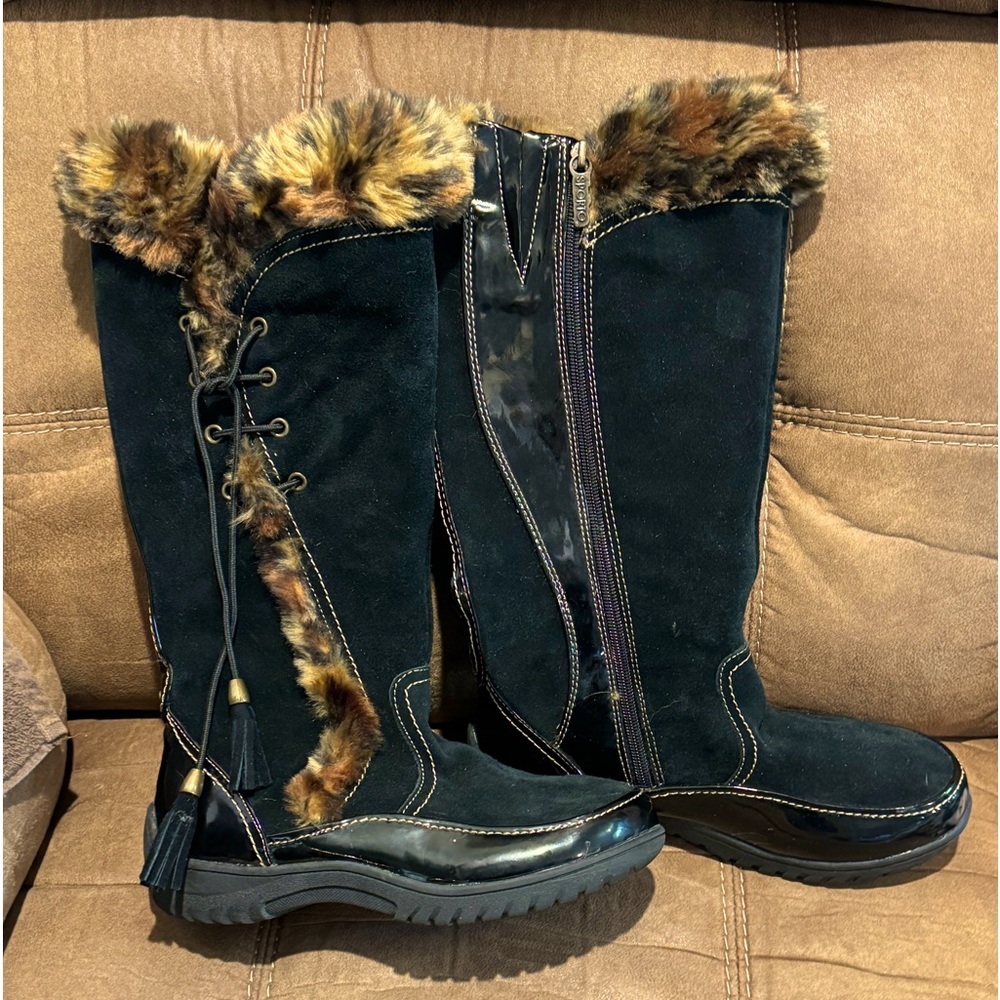 Black leather boots with zip up inside of leg and lace up on the outside w/ fur